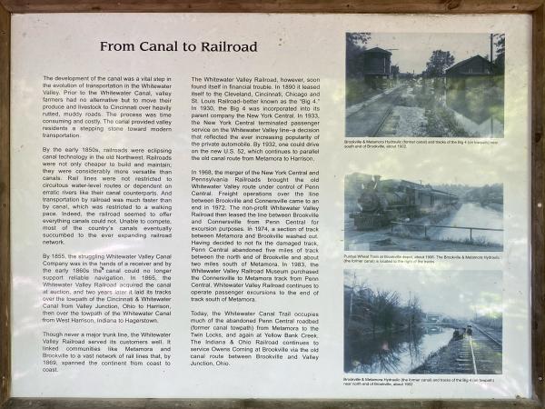 Whitewater Canal and railroad informational board near where the railroad tracks start