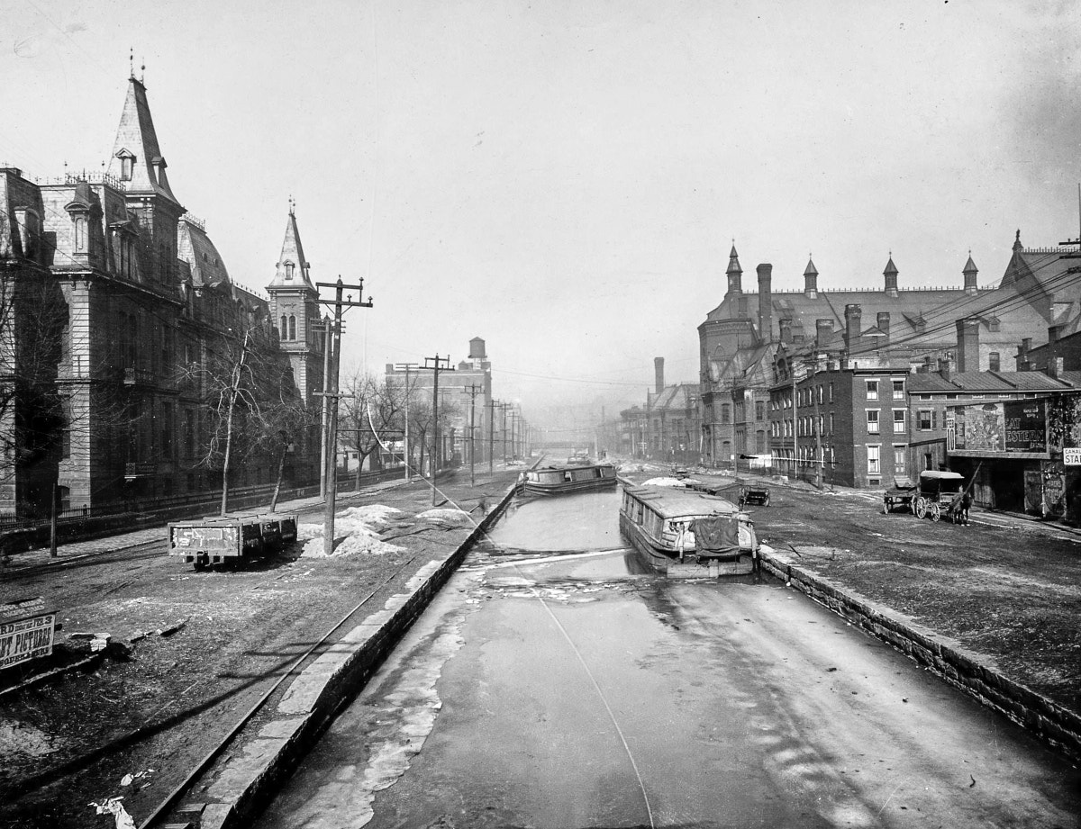 Canal boats Over-the-Rhine are frozen in place and may simply be abandoned as the canal falls out of use.
