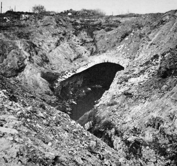 The southern end of the Deer Creek Tunnel was breached by construction of I-71 in March 1966