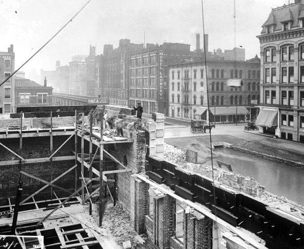 Historic photo of construction of the Hamilton County Courthouse and the Miami & Erie Canal