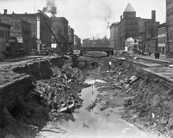 Historic photo of the Miami & Erie Canal and excavation for the subway on April 21, 1920