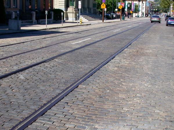 Exposed streetcar tracks on Elm Street in Over-the-Rhine