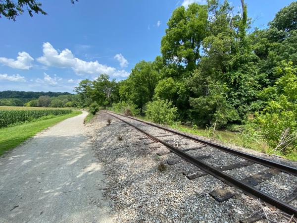 Whitewater Valley Railroad on the canal towpath with the canal on the right