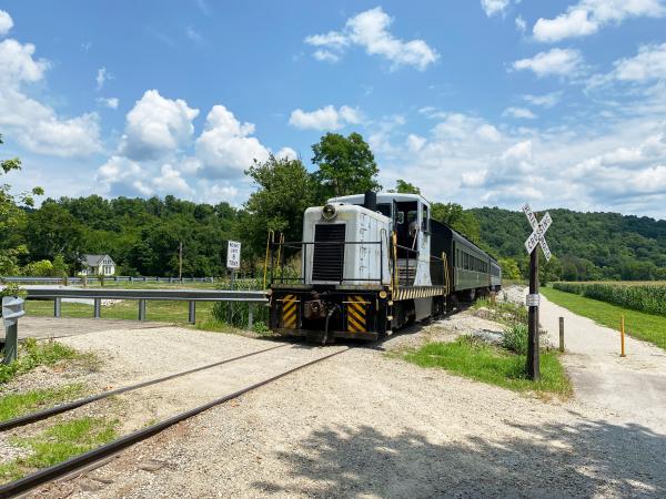 Whitewater Valley Railroad on the canal towpath with the canal on the left