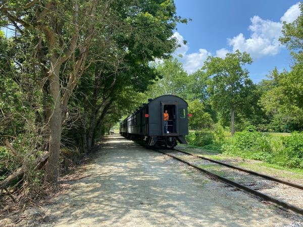 Whitewater Valley Railroad on the canal towpath with the canal on the right