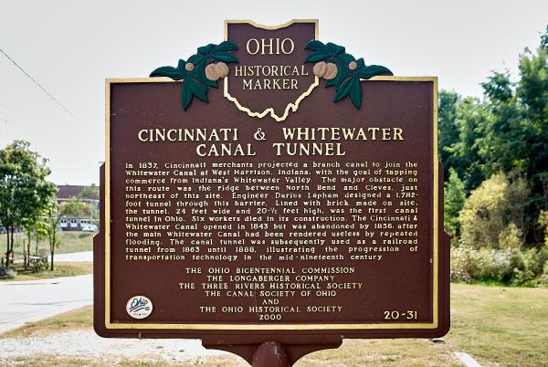 Historic plaque describing the old Cincinnati & Whitewater Canal tunnel in Cleves