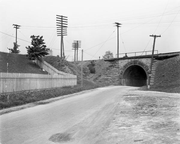 Historic photo of the Duck Creek Road tunnel under the B&O Midland Railroad, as seen from the last photo