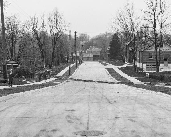 Close-up view of the previous historic photo of the Cincinnati & Westwood crossing Koenig Avenue in Westwood
