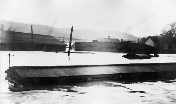 Historic photo of the CG&P Carrel Street yard during the 1913 flood