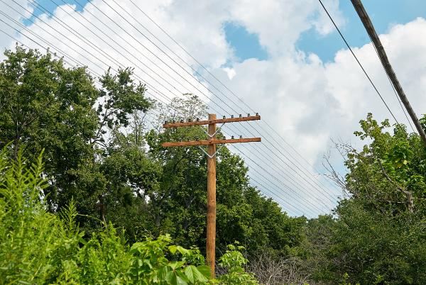 New communications poles along the former CH&D in Elmwood Place
