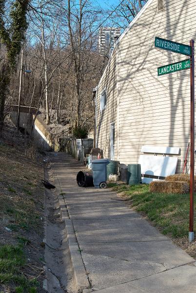 A short sidewalk leading to an abandoned pedestrian underpass of the Indiana & Ohio Oasis, former Pennsylvania/Little Miami Railroad in the East End