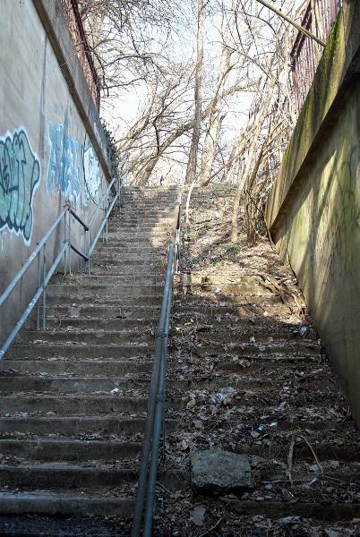 Stairs leading up from the abandoned pedestrian underpass of the Indiana & Ohio Oasis, former Pennsylvania/Little Miami Railroad in the East End