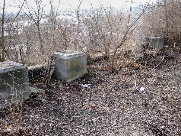 Pedestrian bridge supports at the old Torrence Road station for the Pennsylvania/Little Miami Railroad