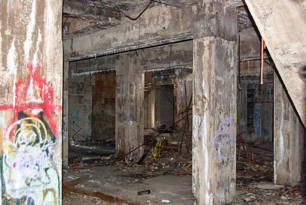 Looking inside Mariemont's old steam heating plant from the gated north entrance