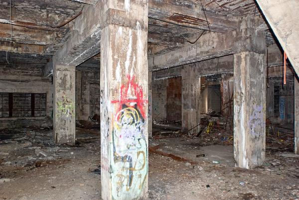 Looking inside Mariemont's old steam heating plant from the gated north entrance