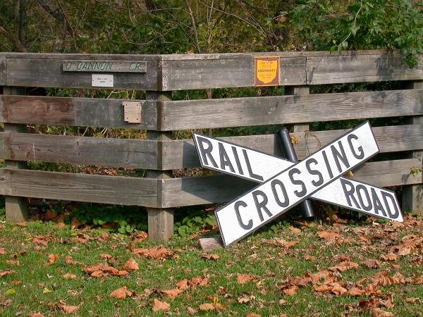 The top of an old railroad crossing sign at O'Bannon Creek in Loveland's Nisbet Park