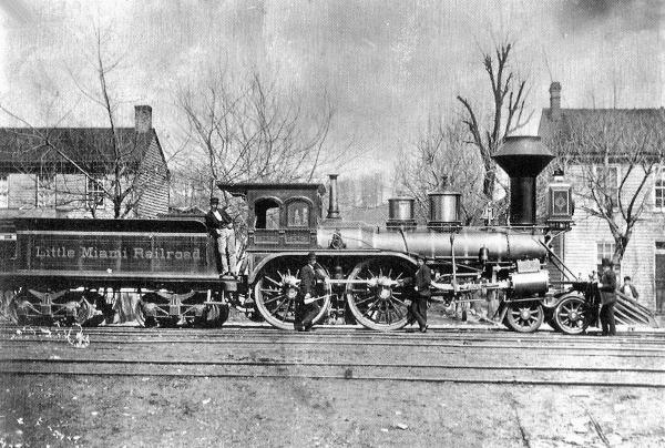 An early wood-burning locomotive on the Little Miami Railroad in Morrow, taken ca. 1865