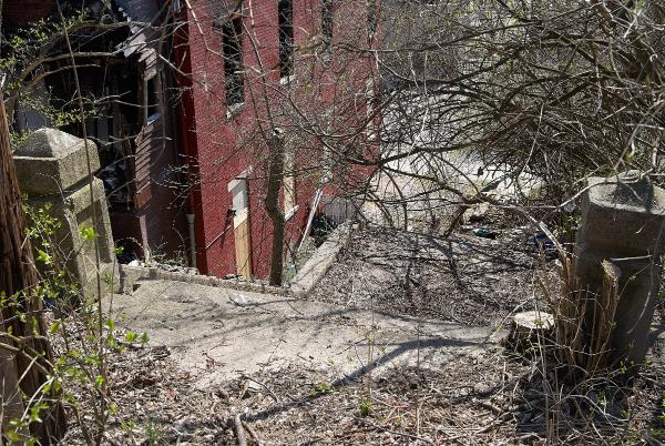 Abandoned stairs connecting Torrence Road at the railroad tracks with Eastern Avenue below