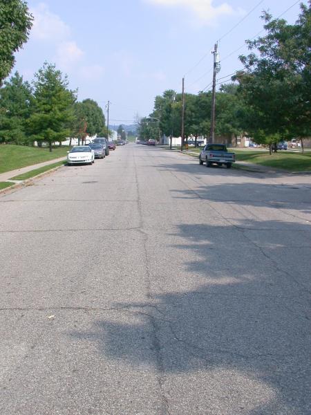 Cracks in the street reval buried tracks on 3rd Avenue in Dayton