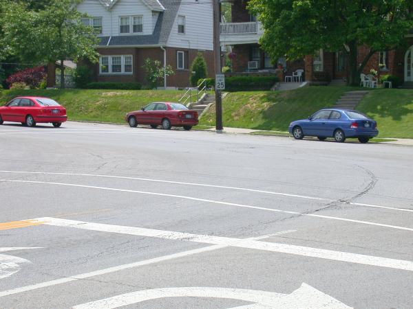 Tracks appearing through deteriorated pavement on Ft. Thomas Avenue in Ft. Thomas