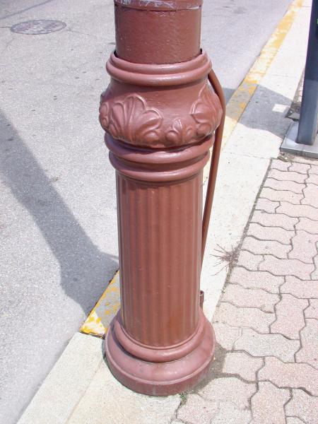 Detail of the decorative trolley pole in downtown St. Bernard